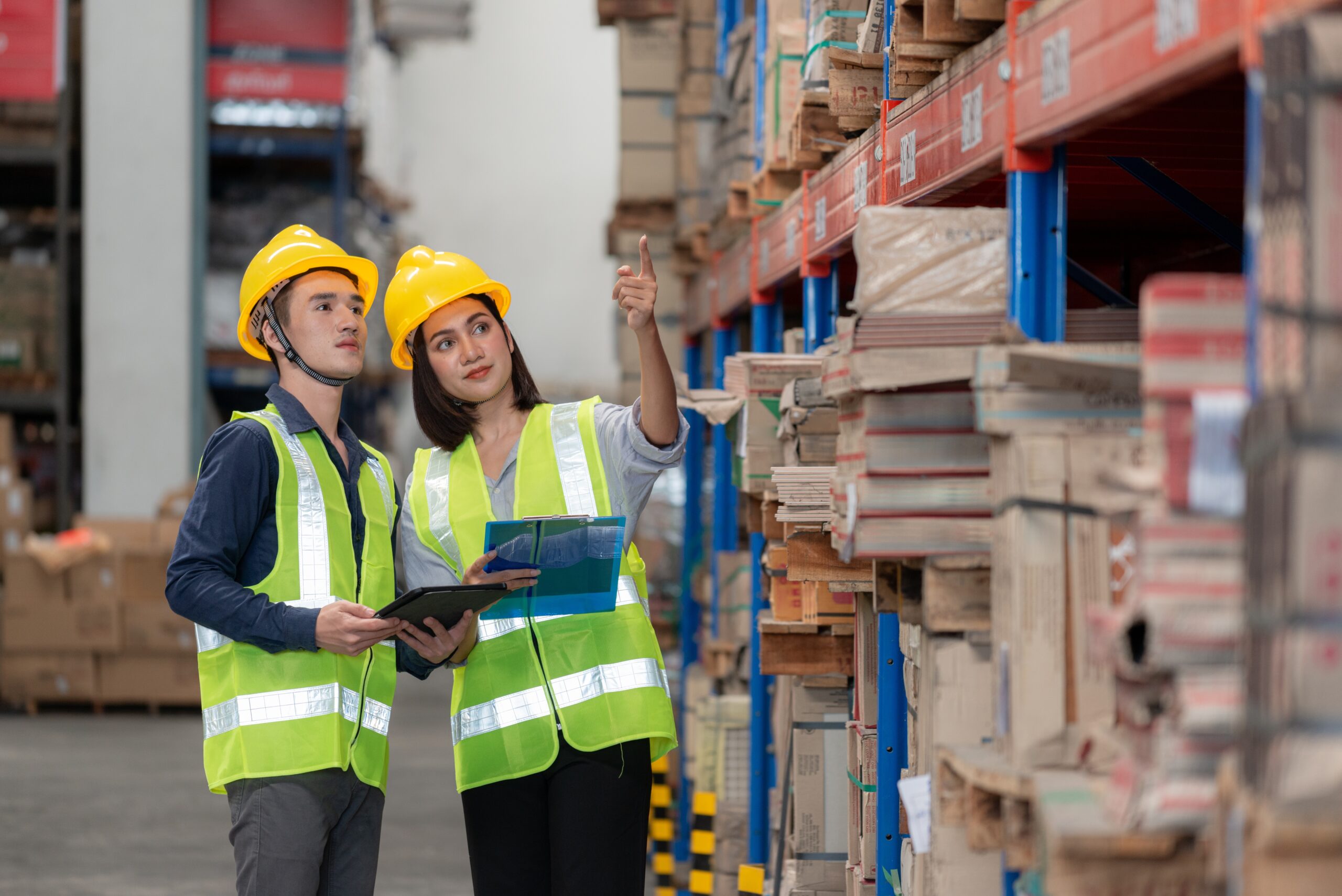 Warehouse,Worker,Checking,Packages,On,Shelf,In,A,Large,Store